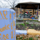 “R.I.P. Tamir Rice” is written on a wooden post near a makeshift memorial at the gazebo where the boy was fatally shot, outside the Cudell Recreation Center in Cleveland on Nov. 22, 2014.